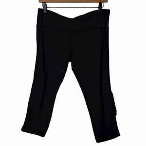 LULULEMON ATHLETICA BLACK WORKOUT CAPR RUFFLE DETAIL LEGGINGS WOMEN 10 PRE-OWNED